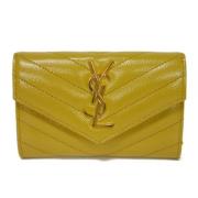 Pre-owned Leather wallets Yves Saint Laurent Vintage , Yellow , Dames