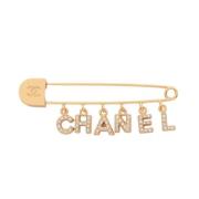 Pre-owned Metal brooches Chanel Vintage , Yellow , Dames