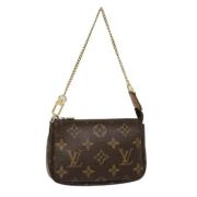 Pre-owned Canvas pouches Louis Vuitton Vintage , Brown , Dames