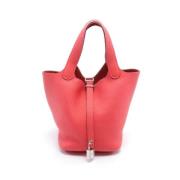 Pre-owned Leather handbags Hermès Vintage , Pink , Dames