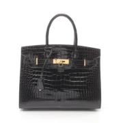 Pre-owned Leather handbags Hermès Vintage , Black , Dames