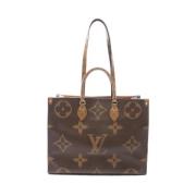 Pre-owned Canvas handbags Louis Vuitton Vintage , Beige , Dames