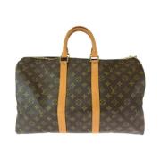 Pre-owned Canvas handbags Louis Vuitton Vintage , Brown , Unisex