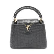 Pre-owned Leather handbags Louis Vuitton Vintage , Black , Dames