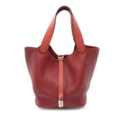 Pre-owned Leather handbags Hermès Vintage , Red , Dames