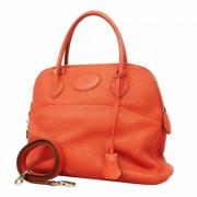 Pre-owned Leather handbags Hermès Vintage , Orange , Dames