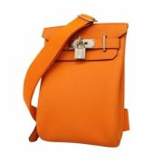 Pre-owned Fabric shoulder-bags Hermès Vintage , Orange , Dames