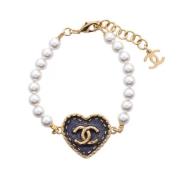 Pre-owned Metal chanel-jewelry Chanel Vintage , Yellow , Dames