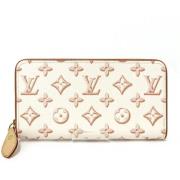 Pre-owned Leather wallets Louis Vuitton Vintage , Beige , Dames