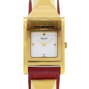 Pre-owned Metal watches Hermès Vintage , Yellow , Dames