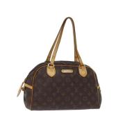 Pre-owned Canvas handbags Louis Vuitton Vintage , Brown , Dames