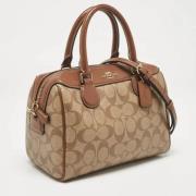 Pre-owned Coated canvas handbags Coach Pre-owned , Beige , Dames