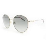 Pre-owned Fabric sunglasses Gucci Vintage , Yellow , Dames