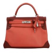 Pre-owned Leather handbags Hermès Vintage , Red , Dames