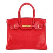 Pre-owned Leather handbags Hermès Vintage , Red , Dames