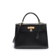 Pre-owned Fabric handbags Hermès Vintage , Black , Dames