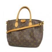 Pre-owned Fabric handbags Louis Vuitton Vintage , Brown , Dames