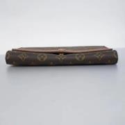 Pre-owned Fabric clutches Louis Vuitton Vintage , Brown , Dames