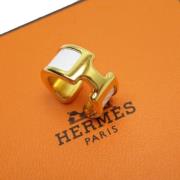 Pre-owned Metal earrings Hermès Vintage , Yellow , Dames