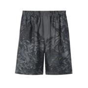 Zijden shorts met flora en fauna print Gucci , Gray , Heren