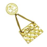 Pre-owned Metal brooches Chanel Vintage , Yellow , Dames