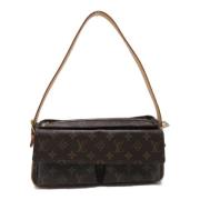 Pre-owned Canvas shoulder-bags Louis Vuitton Vintage , Brown , Dames