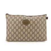 Pre-owned Canvas clutches Gucci Vintage , Beige , Dames