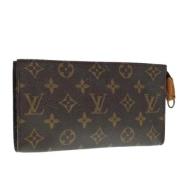 Pre-owned Canvas pouches Louis Vuitton Vintage , Brown , Dames