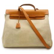 Pre-owned Canvas handbags Hermès Vintage , Brown , Dames