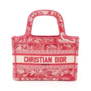 Pre-owned Canvas handbags Dior Vintage , Red , Unisex