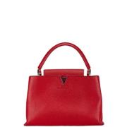 Pre-owned Leather handbags Louis Vuitton Vintage , Red , Dames