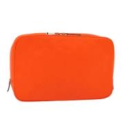 Pre-owned Leather clutches Louis Vuitton Vintage , Orange , Dames