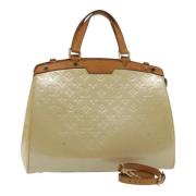 Pre-owned Leather handbags Louis Vuitton Vintage , Beige , Dames