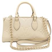 Pre-owned Leather handbags Louis Vuitton Vintage , Beige , Dames