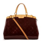 Pre-owned Leather handbags Louis Vuitton Vintage , Red , Dames