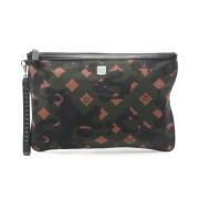 Pre-owned Canvas clutches MCM Pre-owned , Green , Dames