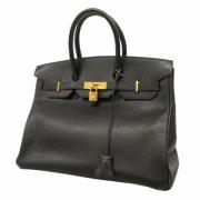 Pre-owned Leather handbags Hermès Vintage , Black , Dames