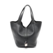 Pre-owned Leather handbags Hermès Vintage , Black , Dames