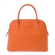 Pre-owned Leather handbags Hermès Vintage , Orange , Dames