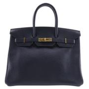 Pre-owned Leather handbags Hermès Vintage , Black , Dames