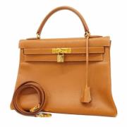 Pre-owned Leather handbags Hermès Vintage , Brown , Dames