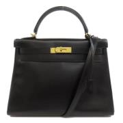 Pre-owned Leather handbags Hermès Vintage , Black , Dames