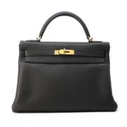 Pre-owned Leather handbags Hermès Vintage , Black , Dames