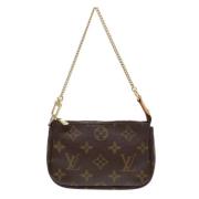 Pre-owned Canvas clutches Louis Vuitton Vintage , Brown , Dames