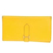 Pre-owned Leather wallets Hermès Vintage , Yellow , Dames