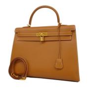 Pre-owned Leather handbags Hermès Vintage , Yellow , Dames