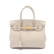 Pre-owned Leather handbags Hermès Vintage , Beige , Dames