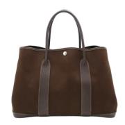 Pre-owned Canvas handbags Hermès Vintage , Brown , Dames