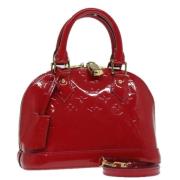 Pre-owned Leather handbags Louis Vuitton Vintage , Red , Dames