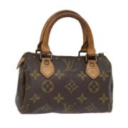 Pre-owned Canvas handbags Louis Vuitton Vintage , Brown , Dames